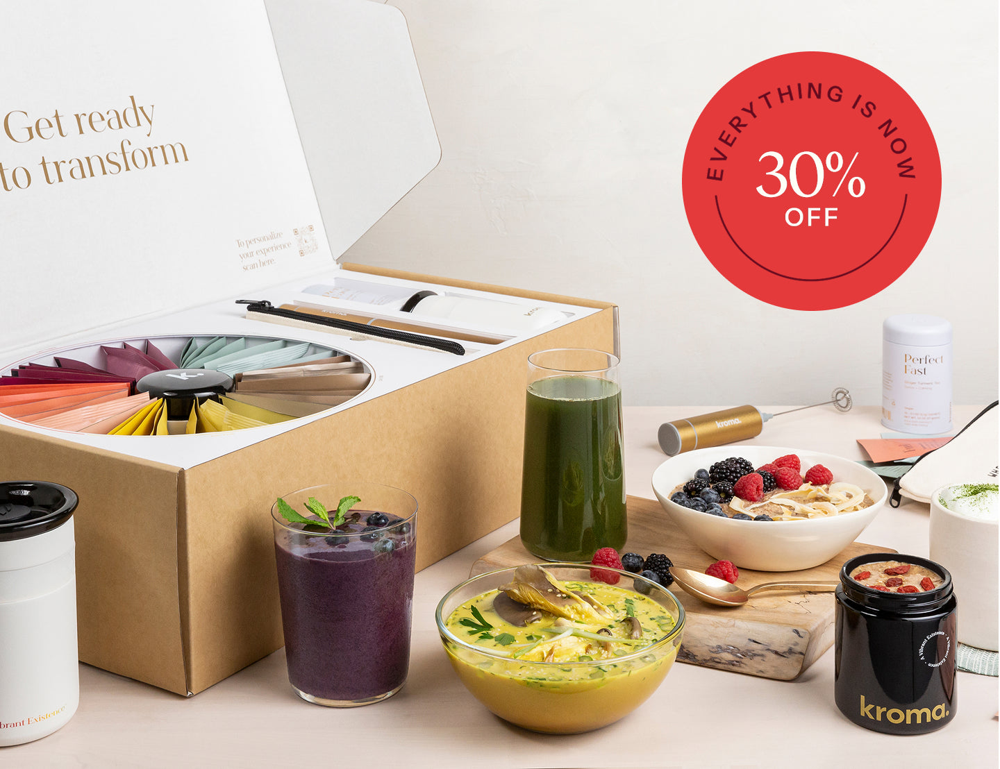 Kroma’s Reset displayed alongside a healthy smoothie, a bowl of fresh fruits, and vegetable soup.