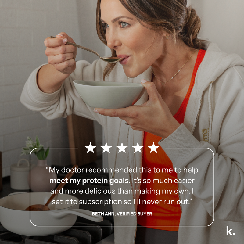 Woman eating from a bowl with a spoon in a kitchen setting, featuring a five-star review.