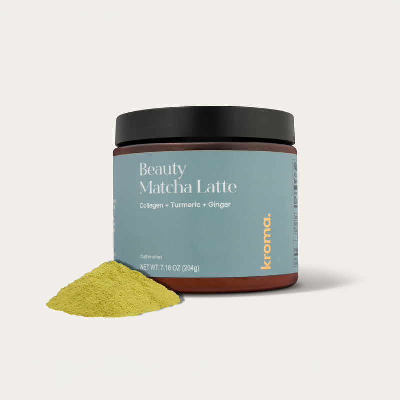 Jar of 'Beauty Matcha Latte' powder with a scoop of powder on a white background