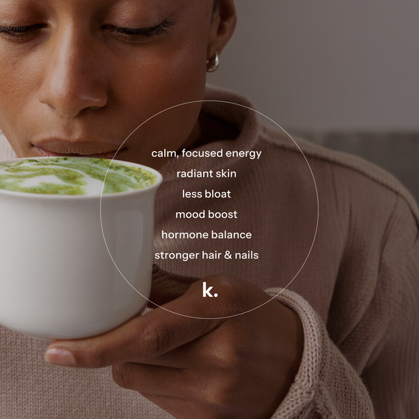 Person holding a cup of green matcha with text about health benefits and brand 'k.'