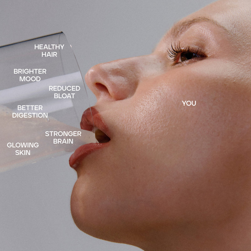 Close-up of a woman's face with text overlay on a gray background